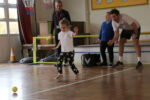Roy Turnham watches a vision impaired girl taking part in the VI tennis taster day.