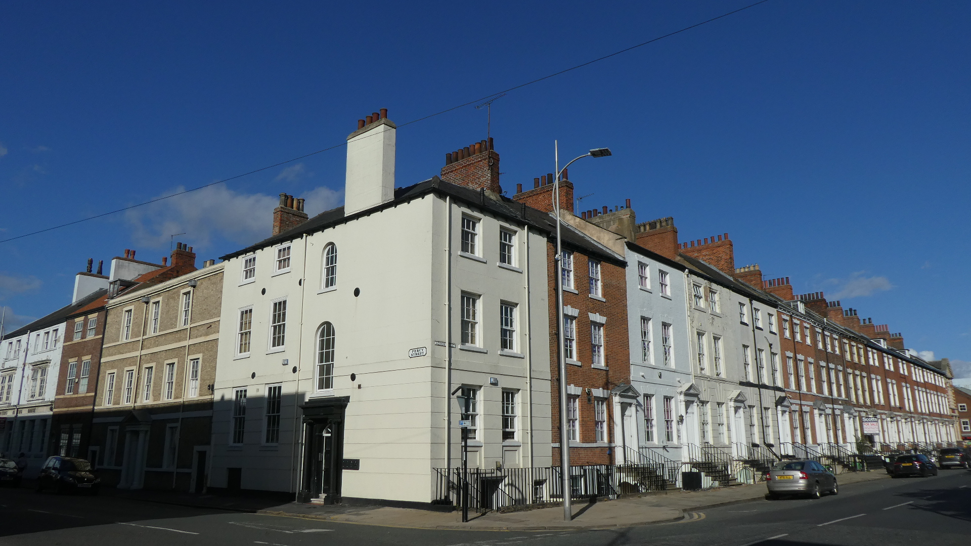 A row of terraced properties on the corner of Percy Street and Albion Street, in Georgian New Town Conservation Area.