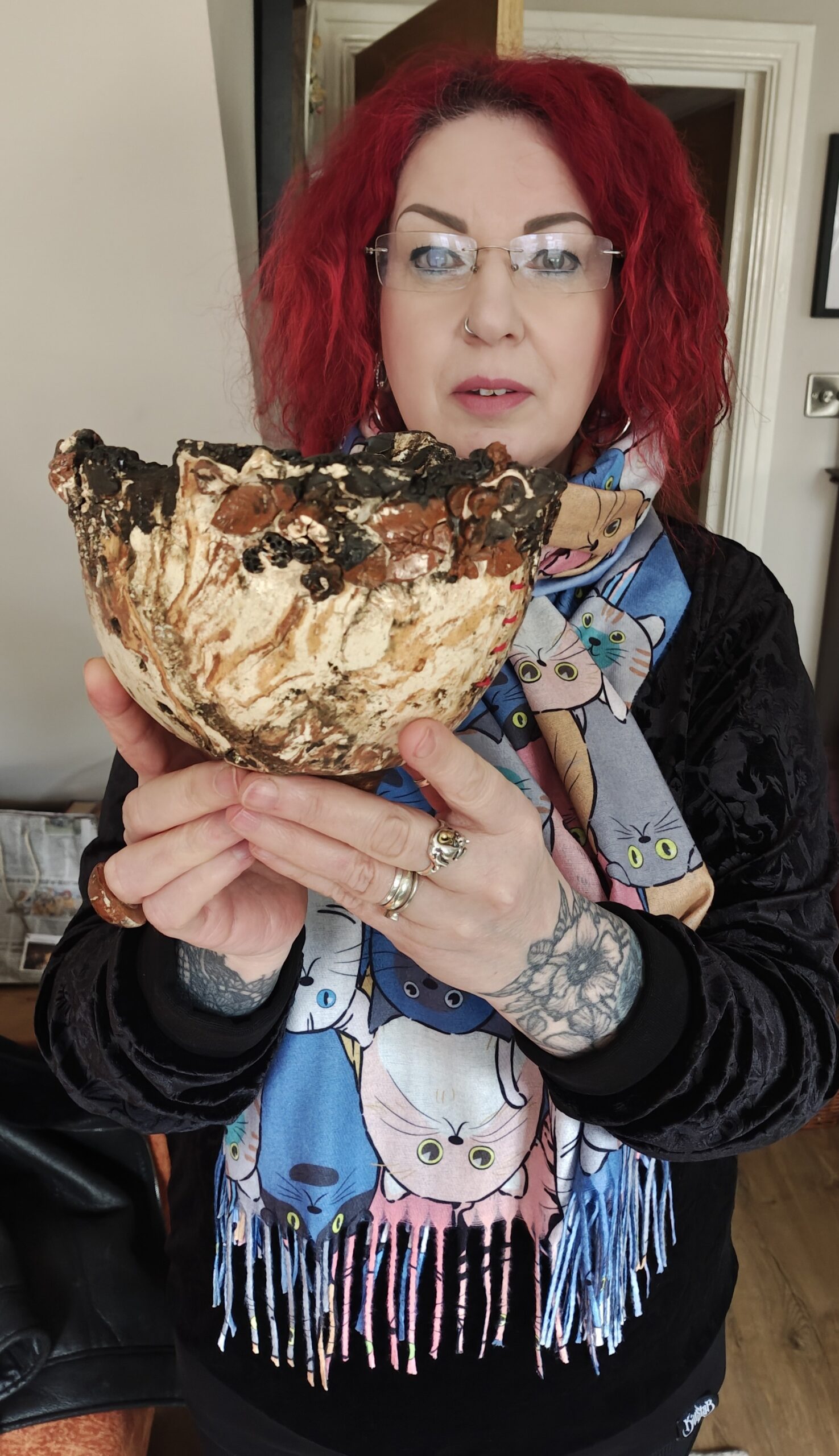 Amanda Spry holding one of her ceramic creations.