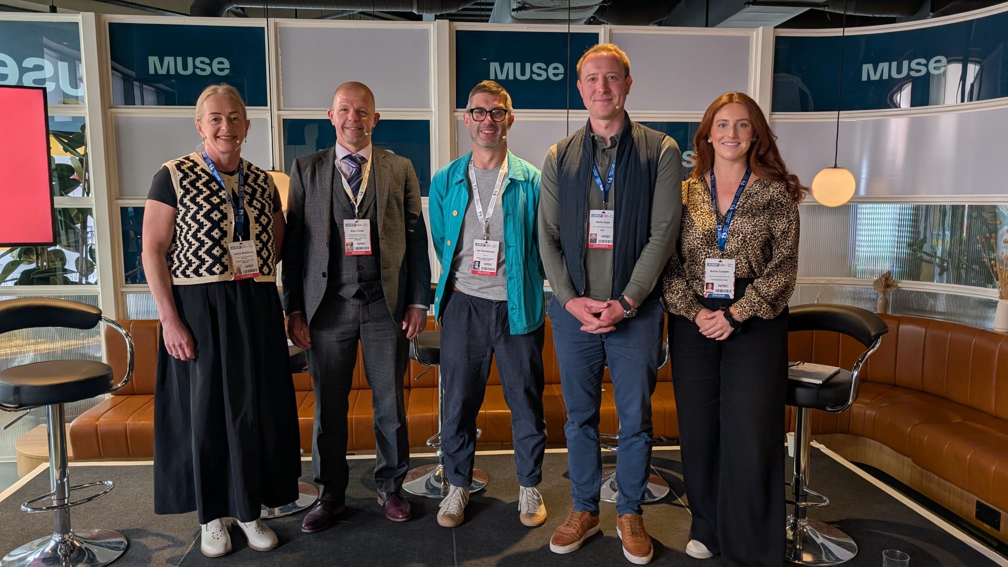 Claire Bradbury and Alex Codd from Hull City Council (far left and left) with representatives of Muse at the 2025 UKREiiF.