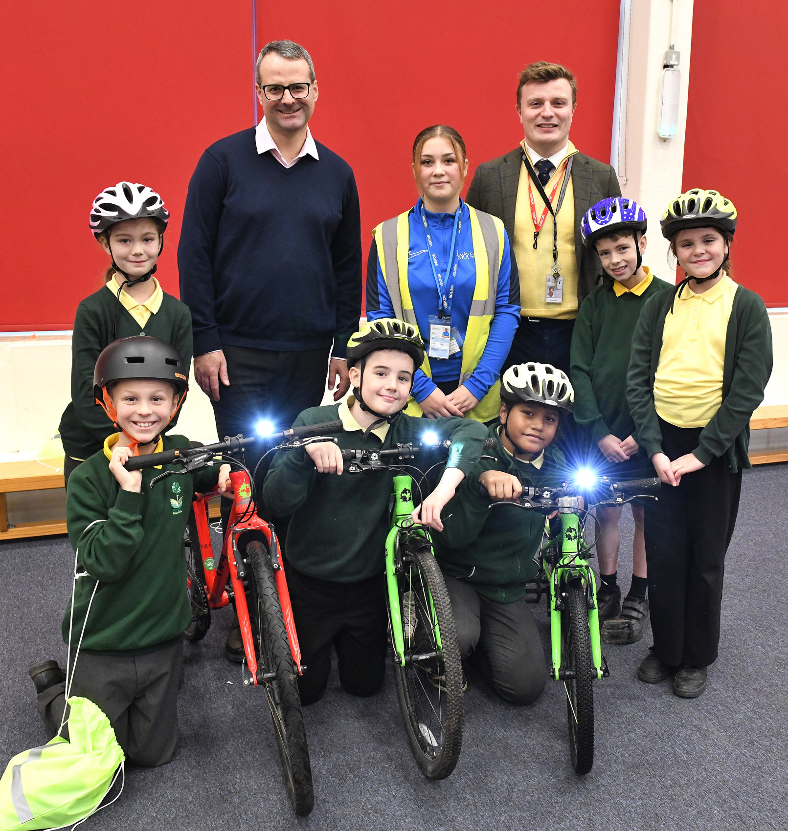 Pupils at Priory Primary School with their new bike lights alongside Councillor Mark Ieronimo (back left), Hannah Smith; coach at First Step Cycle; (centre) and deputy police and crime commissioner, Leo Hammond (back right)
