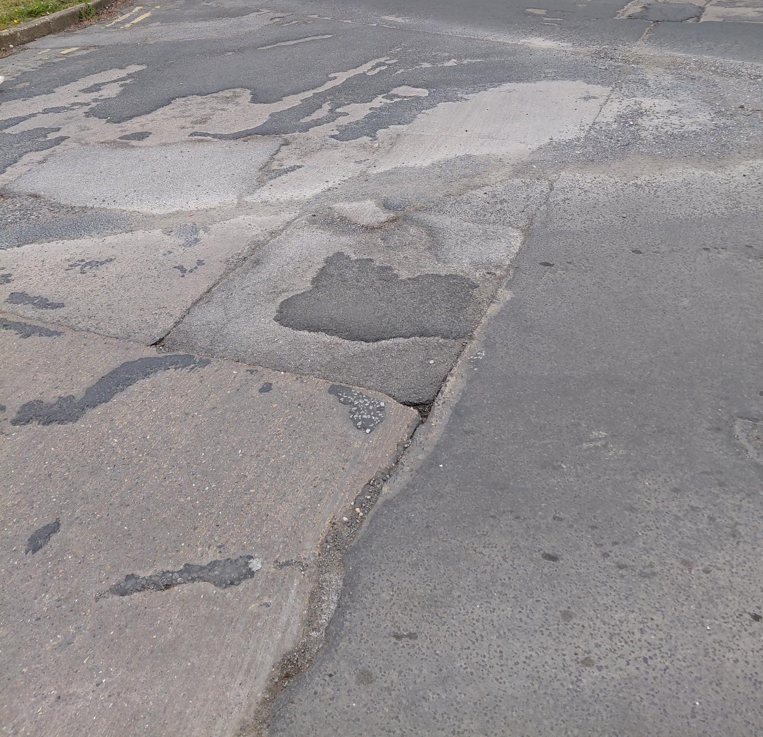 A close-up of Falkland Road surface showing its current state.