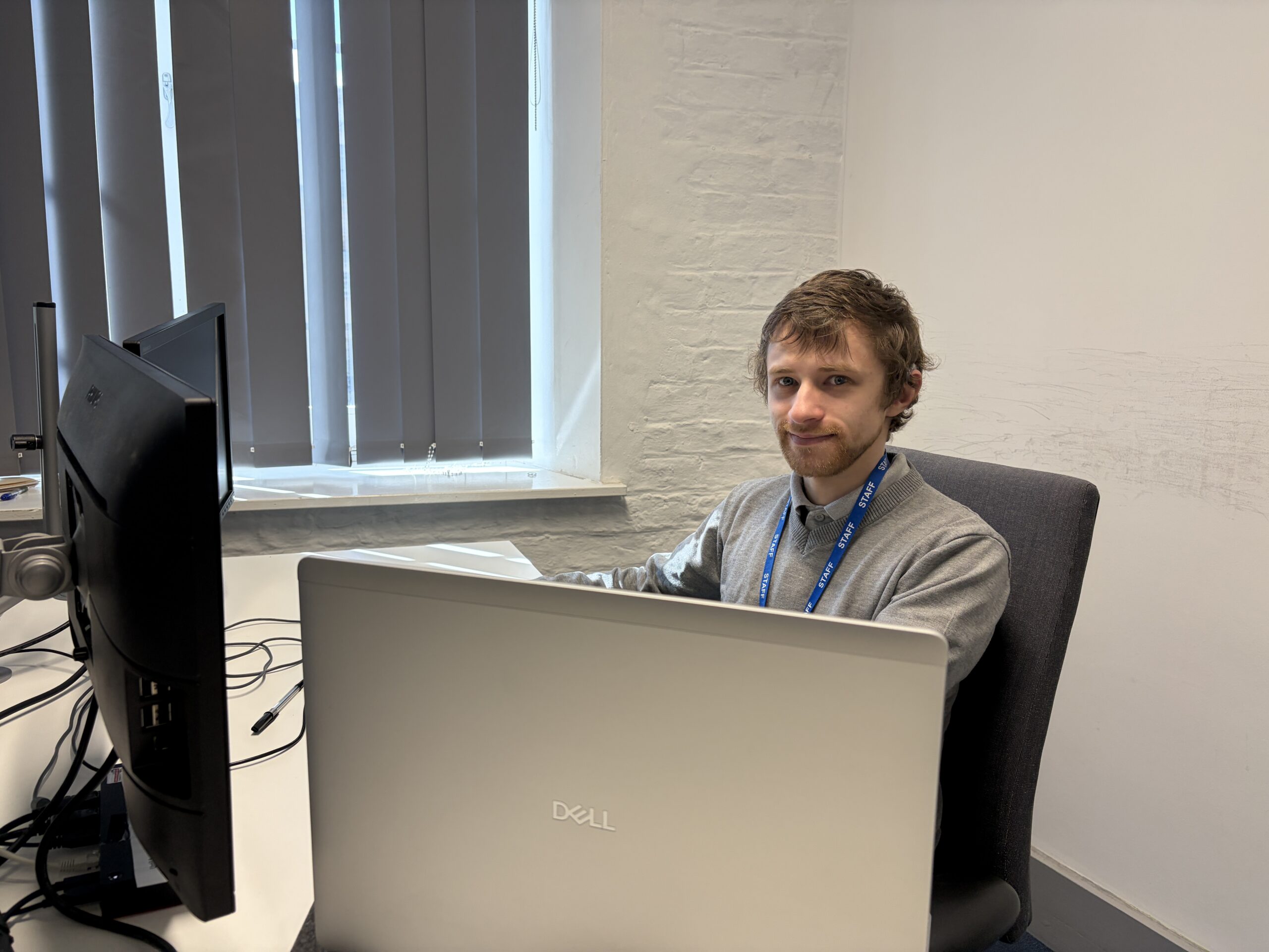 Macauley Tranmer at his desk in Warehouse 9.