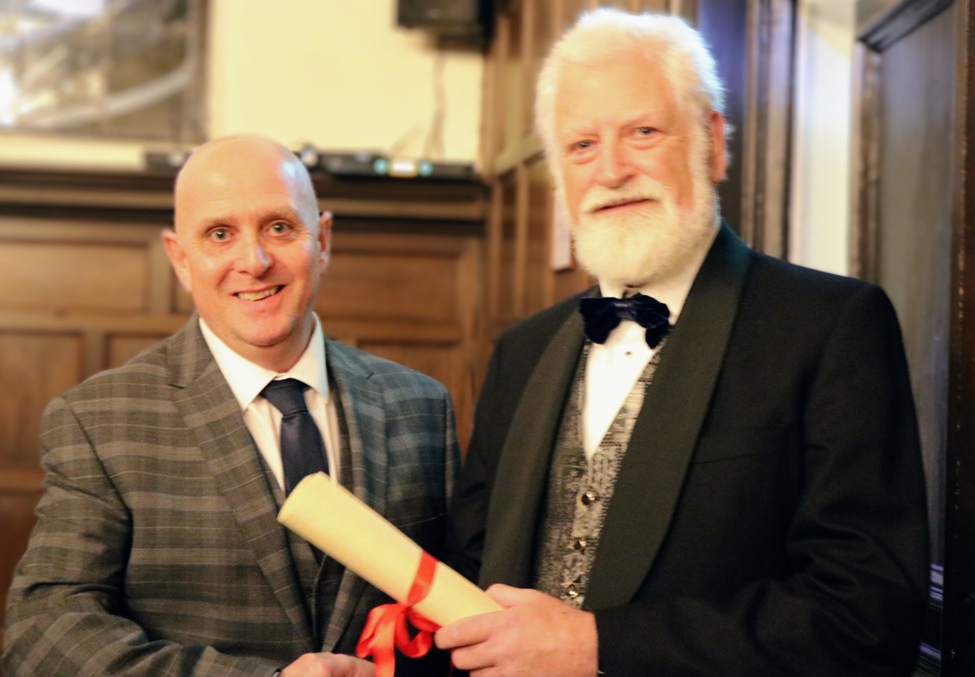 Paul Took receiving his accreditation from Bill Jermey, chairman of the Institute of Meat.