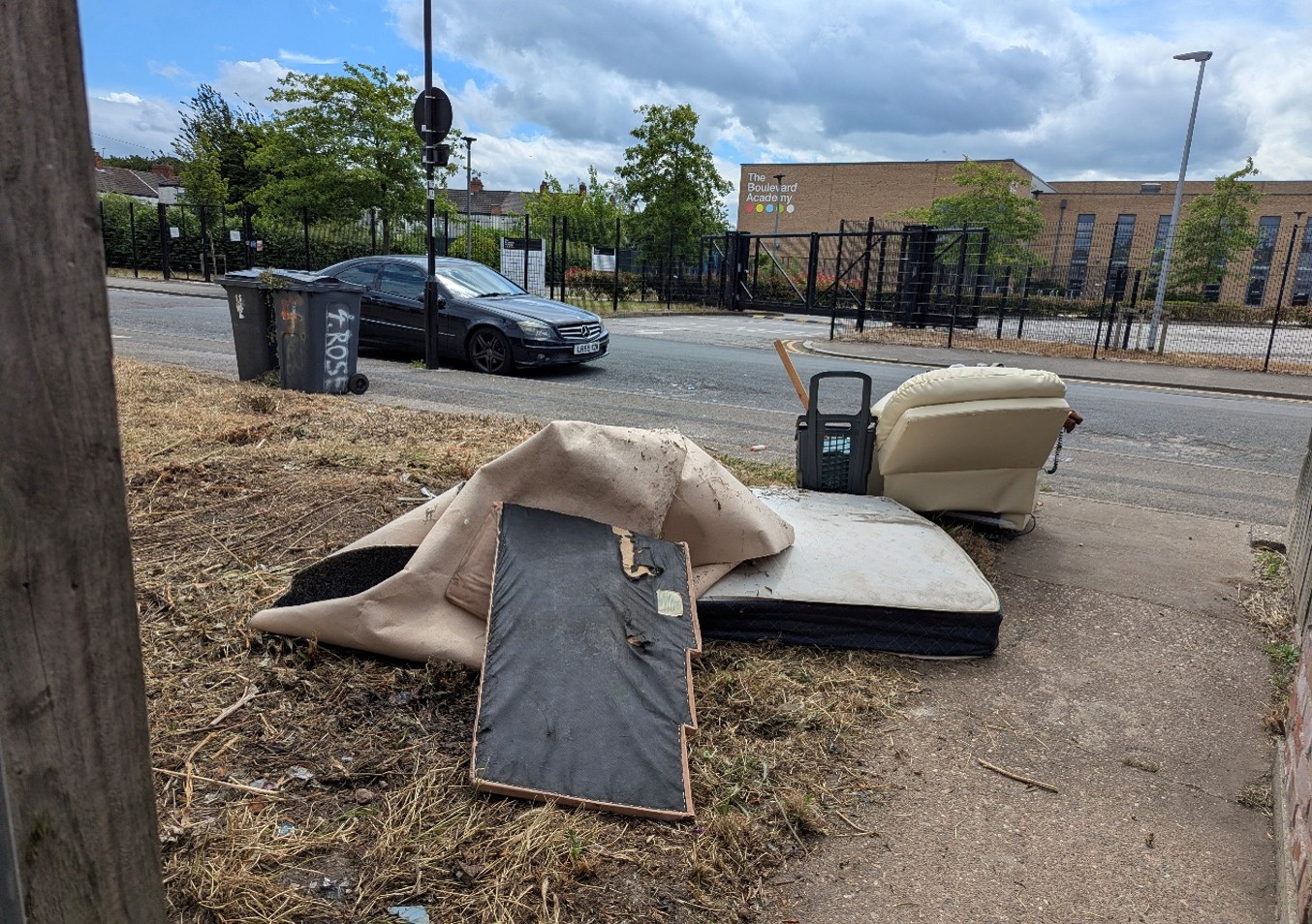 Waste fly-tipped by Miss Christine Carter. Waste comprises of a matress and an armchair.