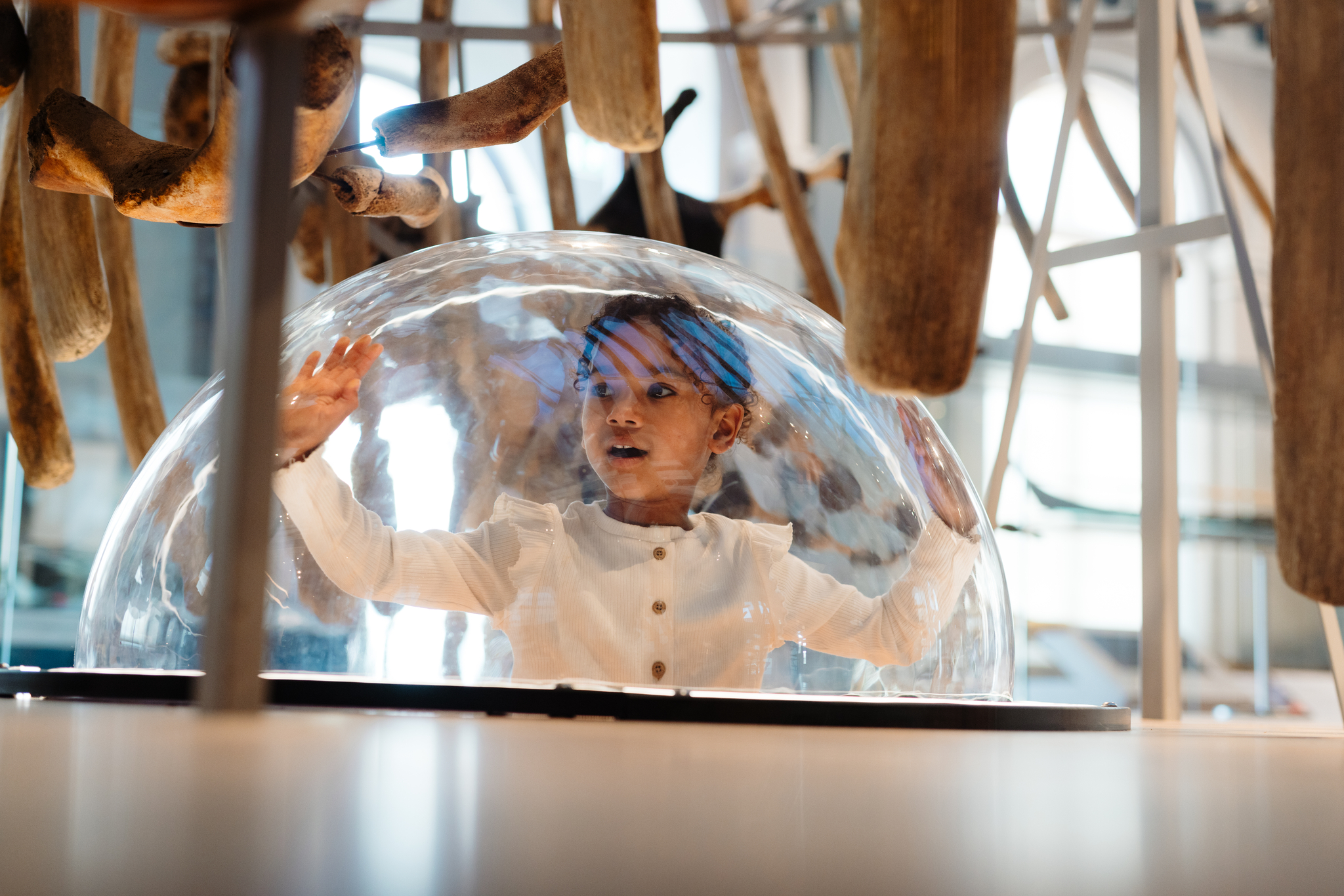 Young visitor in the belly of the North Atlantic Whale in Hull Maritime Museum