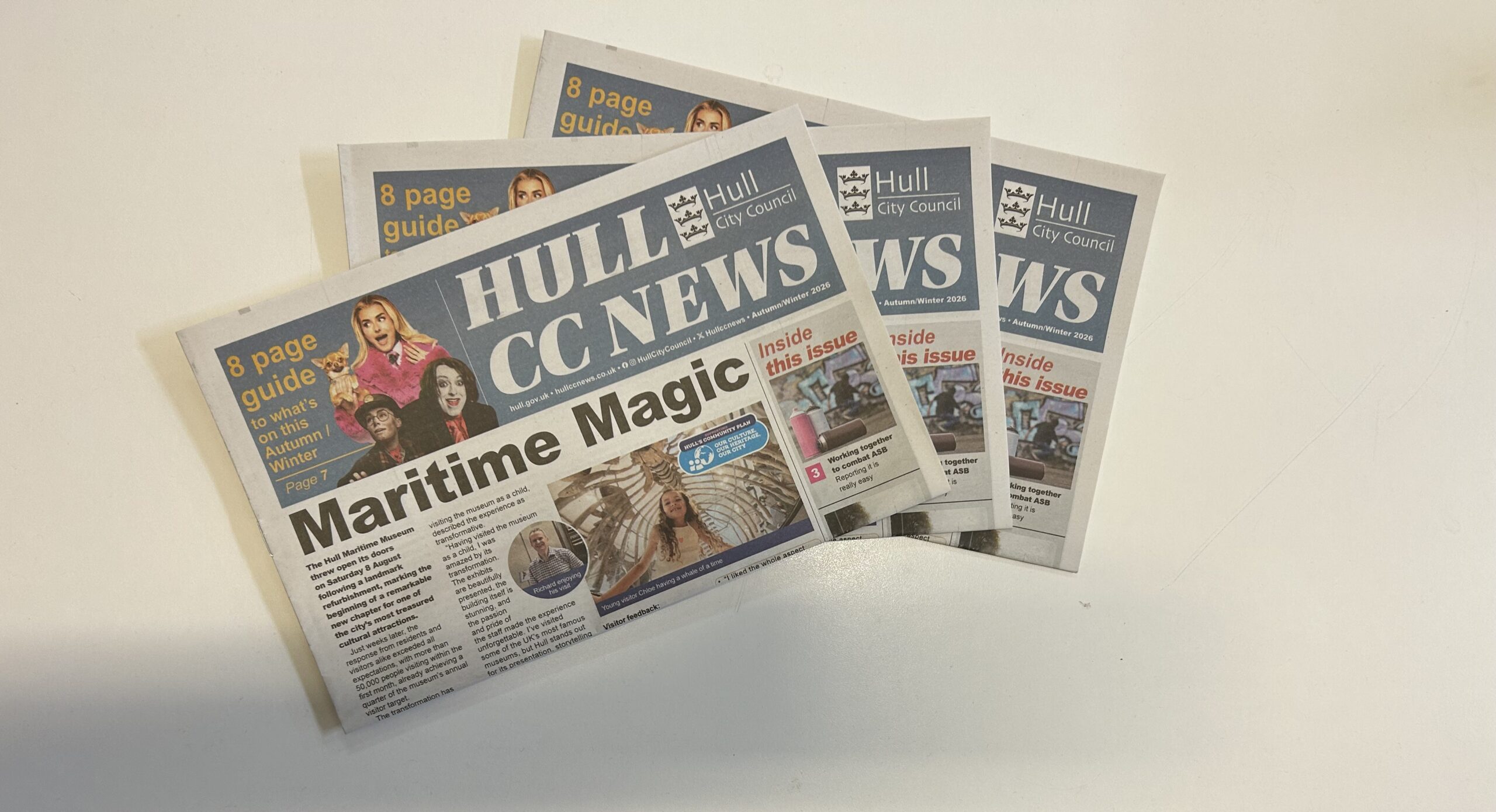 Copies of Hull CC Newspaper fanned out.