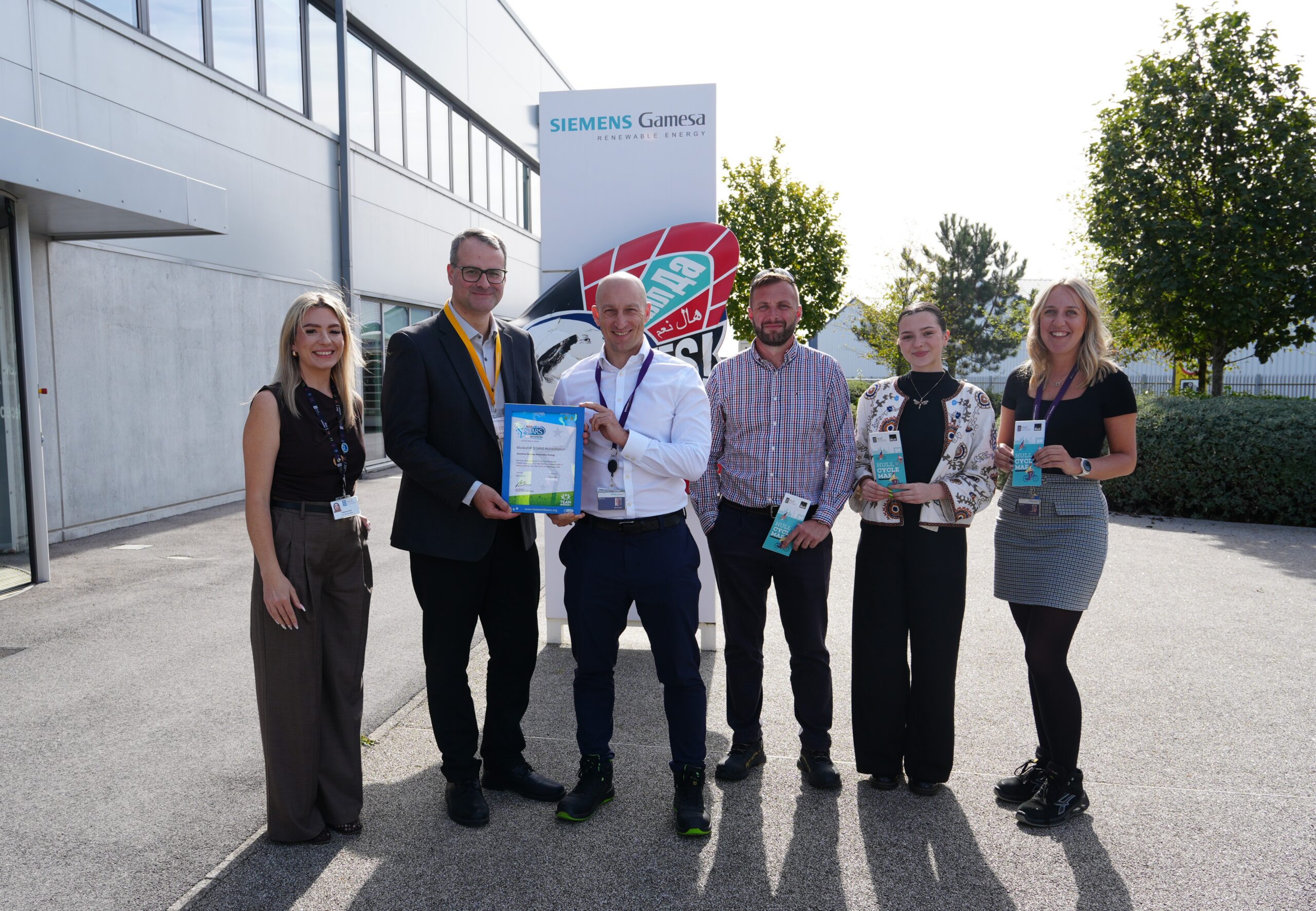 Siemens Gamesa was presented with its Modeshift STARS certification by Hull City Council (L to R – Caitlynne Adams and Councillor Mark Ieronimo from Hull City Council with Andy Sykes, Paul Higgins, Samantha Roberts and Rosie Butler from Siemens Gamesa)